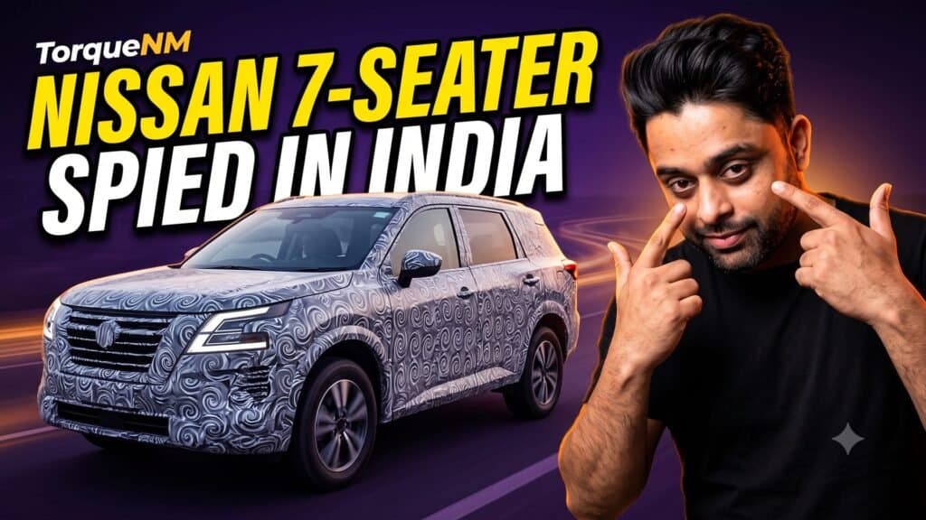 Camouflaged Nissan three-row SUV test mule based on the Tekton